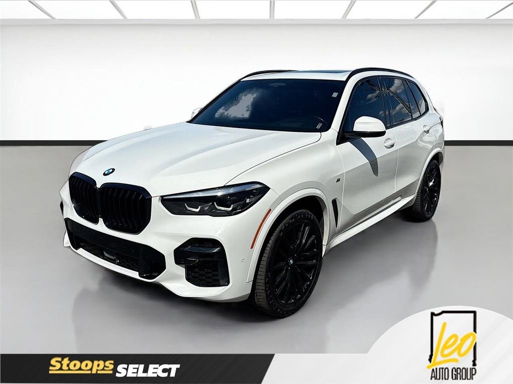 2023 BMW X5 M50i in White — front three-quarter view