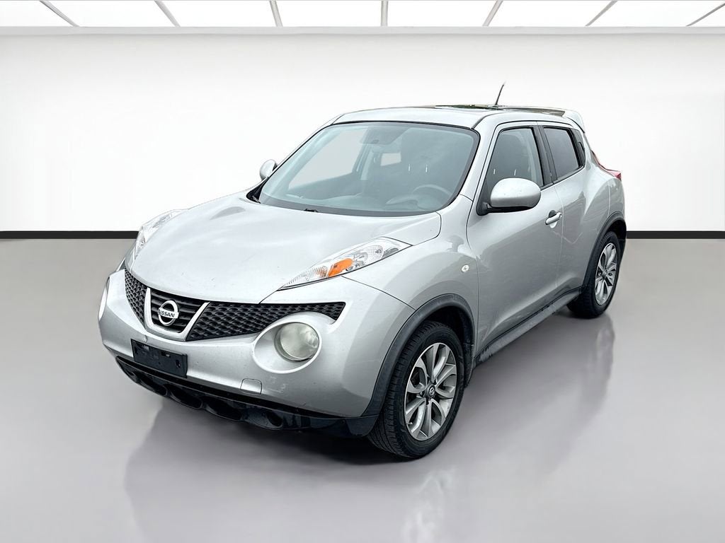 2011 Nissan Juke SV in Silver — front three-quarter view