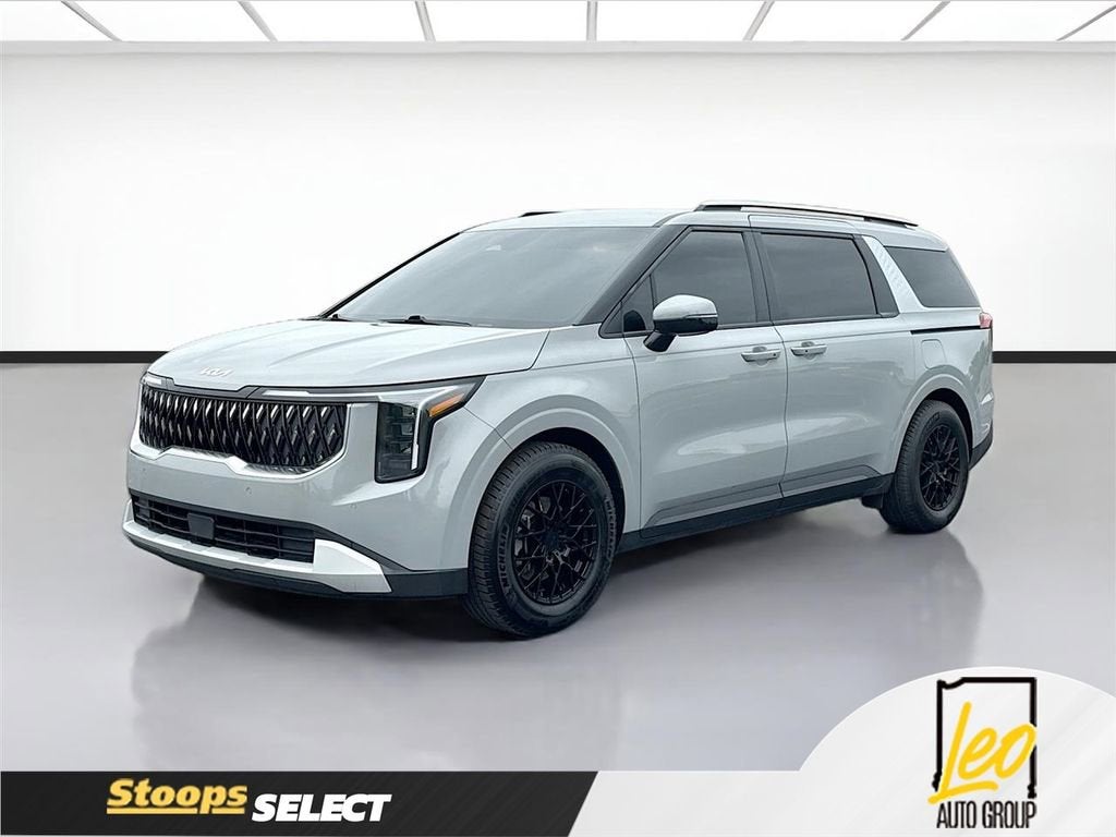 2025 Kia Carnival MPV EX in Silver — front three-quarter view