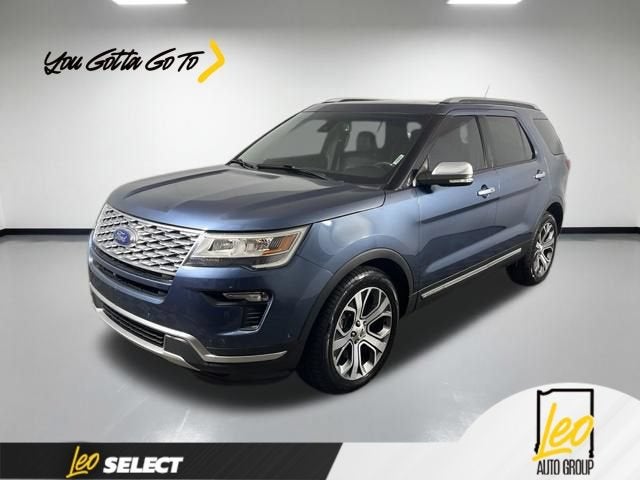 2018 Ford Explorer Platinum in White — front three-quarter view