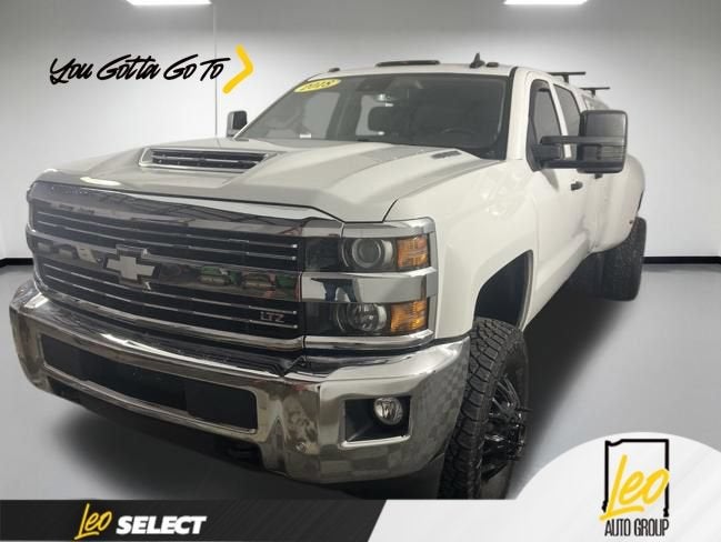 2018 Chevrolet Silverado 3500 HD LTZ in Summit White — front three-quarter view