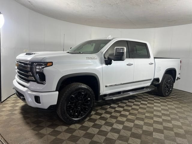 2026 Chevrolet Silverado 2500 HD High Country in Polar White Tricoat — front three-quarter view