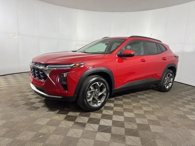 2026 Chevrolet Trax LT in Apex Red — front three-quarter view