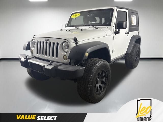 2013 Jeep Wrangler Sport in Bright White Clearcoat — front three-quarter view