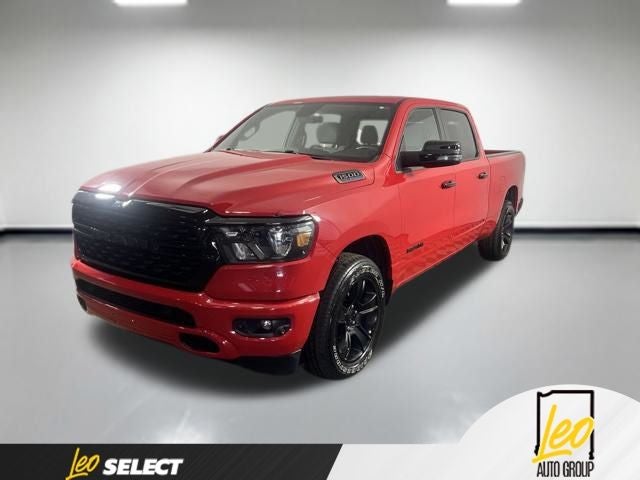 2023 RAM 1500 Big Horn Crew Cab 4x4 6'4' Box in Flame Red Clearcoat — front three-quarter view