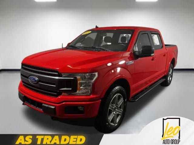2019 Ford F-150 XLT in Race Red — front three-quarter view