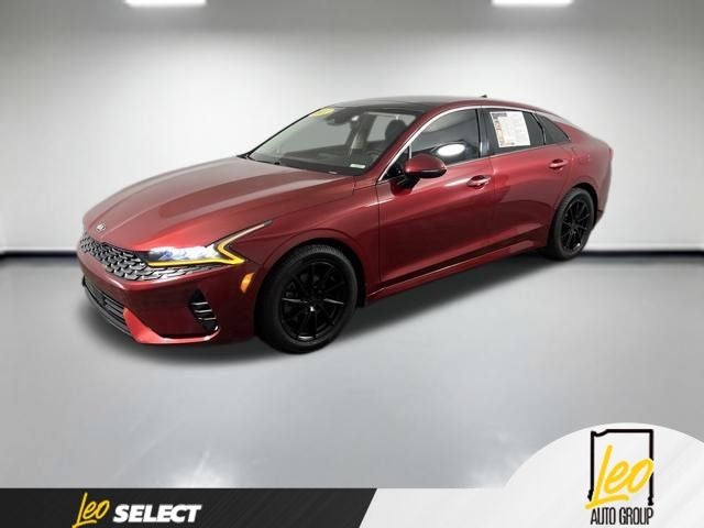 2021 Kia K5 EX in Passion Red — front three-quarter view