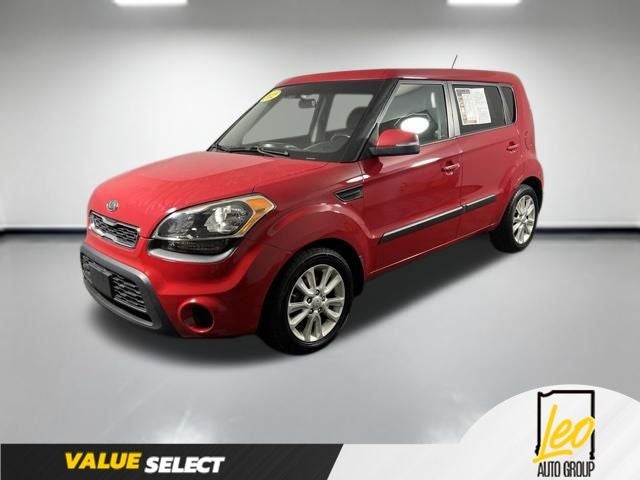 2012 Kia Soul Plus in Molten — front three-quarter view