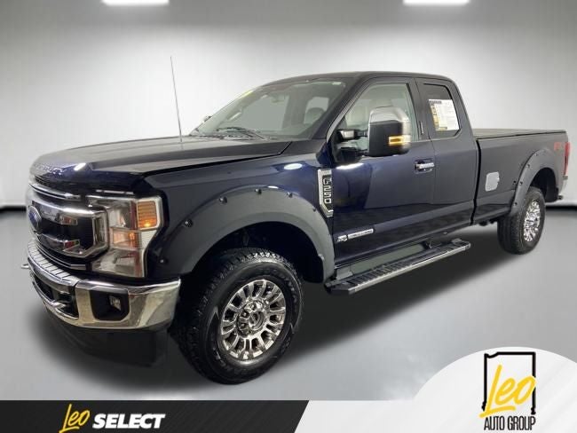 2022 Ford F-250SD XLT in Antimatter Blue Metallic — front three-quarter view