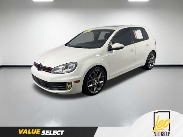 2013 Volkswagen GTI Base in Candy White — front three-quarter view