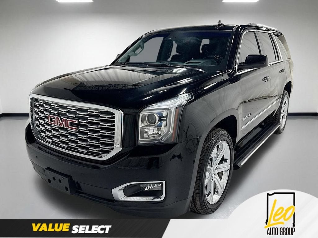 2018 GMC Yukon Denali in Black — front three-quarter view