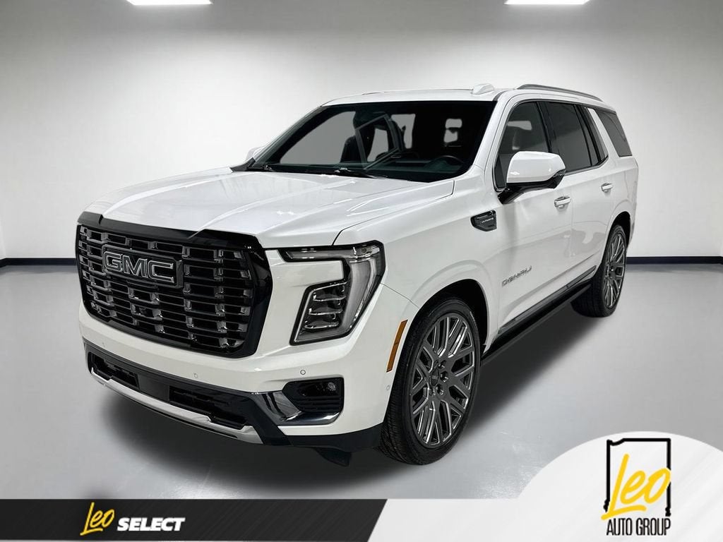 2025 GMC Yukon Denali Ultimate in White Frost Tricoat — front three-quarter view
