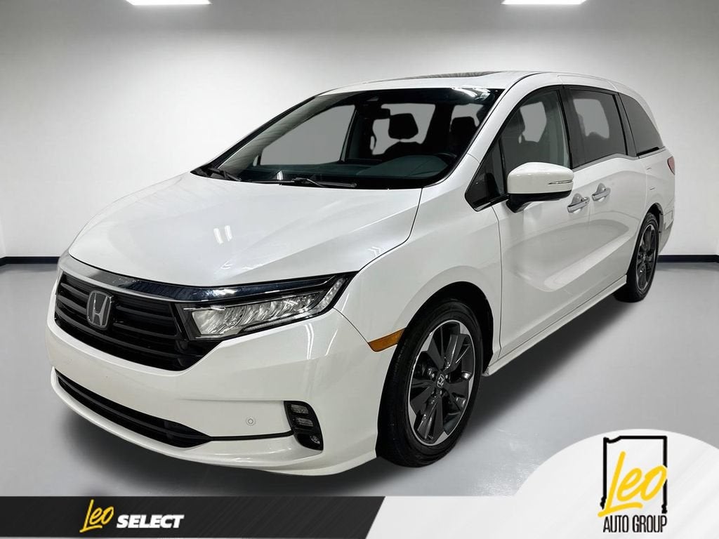 2024 Honda Odyssey Elite in White — front three-quarter view