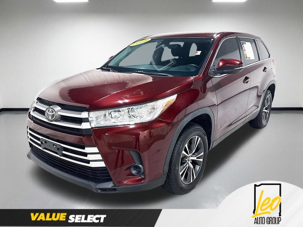2019 Toyota Highlander LE in Red — front three-quarter view