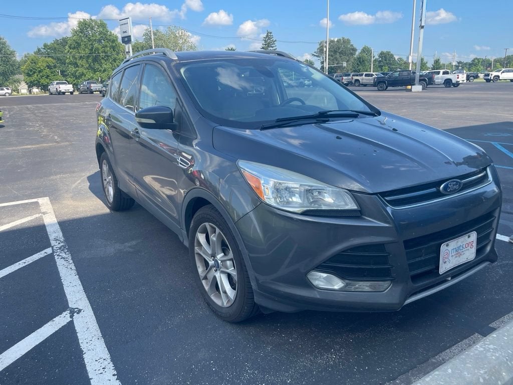 2015 Ford Escape Titanium in White — front three-quarter view