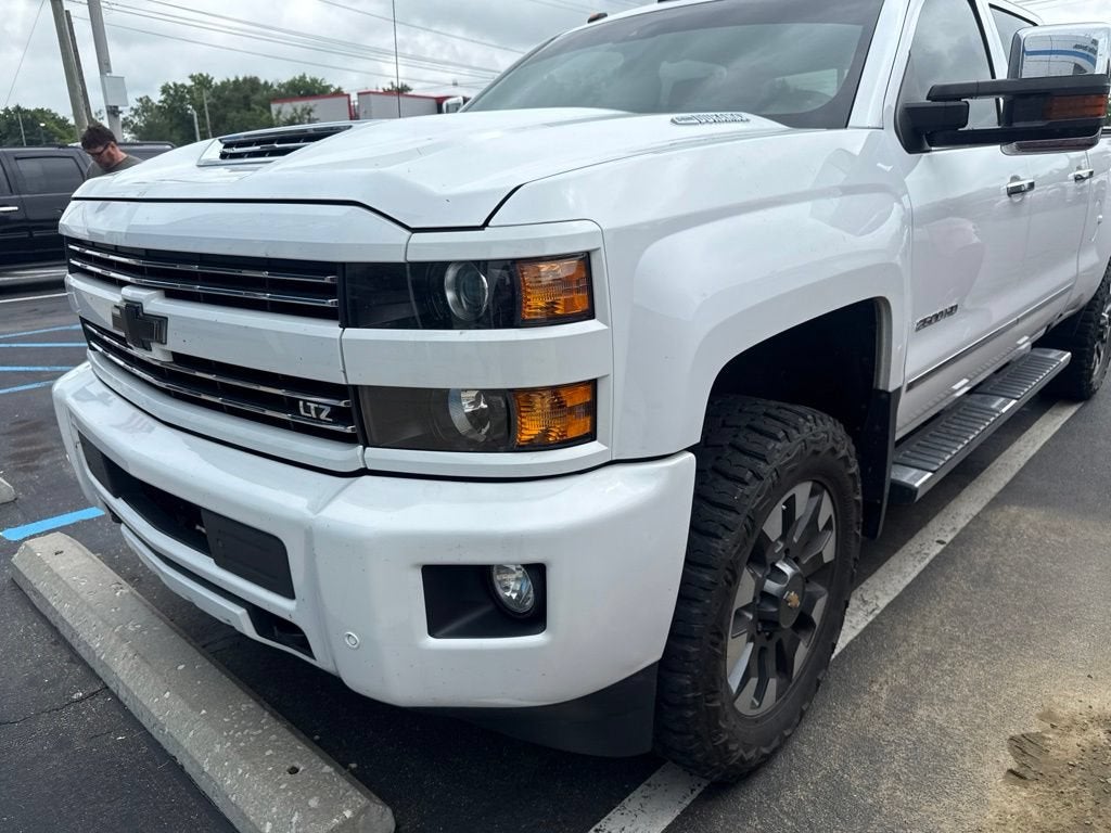 2017 Chevrolet Silverado 2500 HD LTZ in Summit White — front three-quarter view