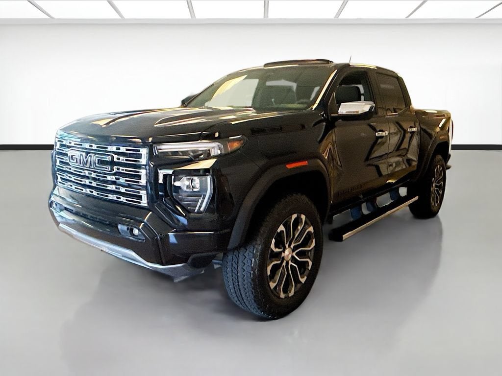 2026 GMC Canyon Denali in Onyx Black — front three-quarter view
