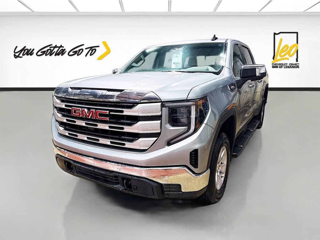 2026 GMC Sierra 1500 SLE in Sterling Metallic — front three-quarter view